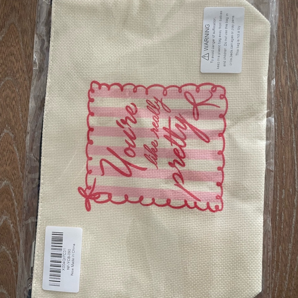 Cream and Pink Cosmetic Bag